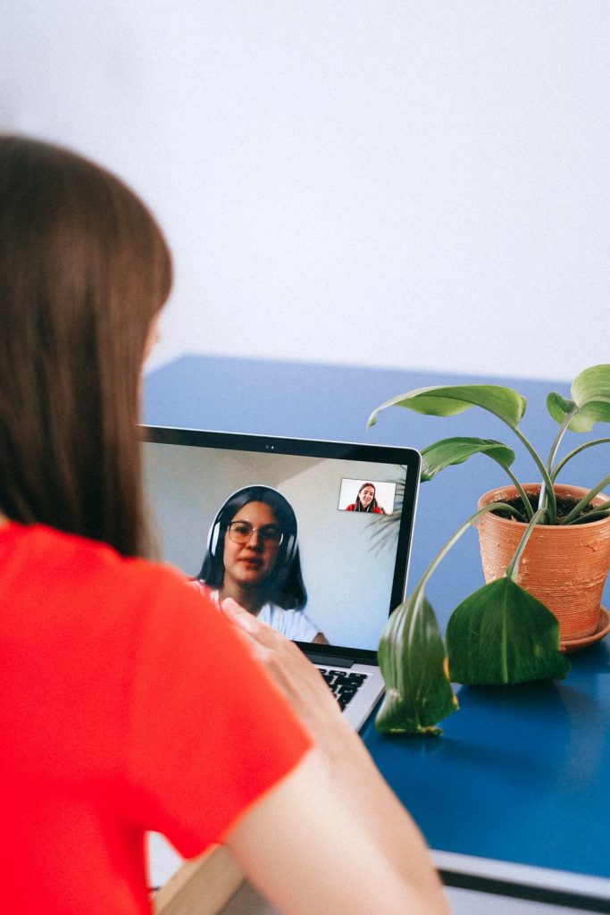 Woman watching a presentation on Zoom